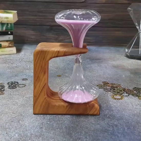 Hourglass original design with an olive wood support 10 min